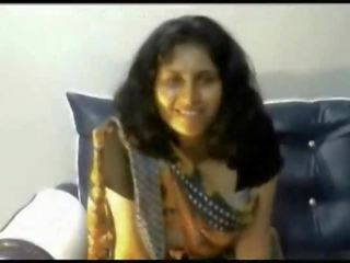 Desi indian damsel stripping in saree on webcam showing bigtits
