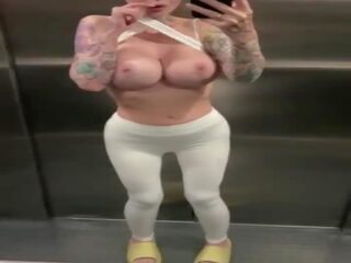 Bald bitch squirting orgasm in public elevator